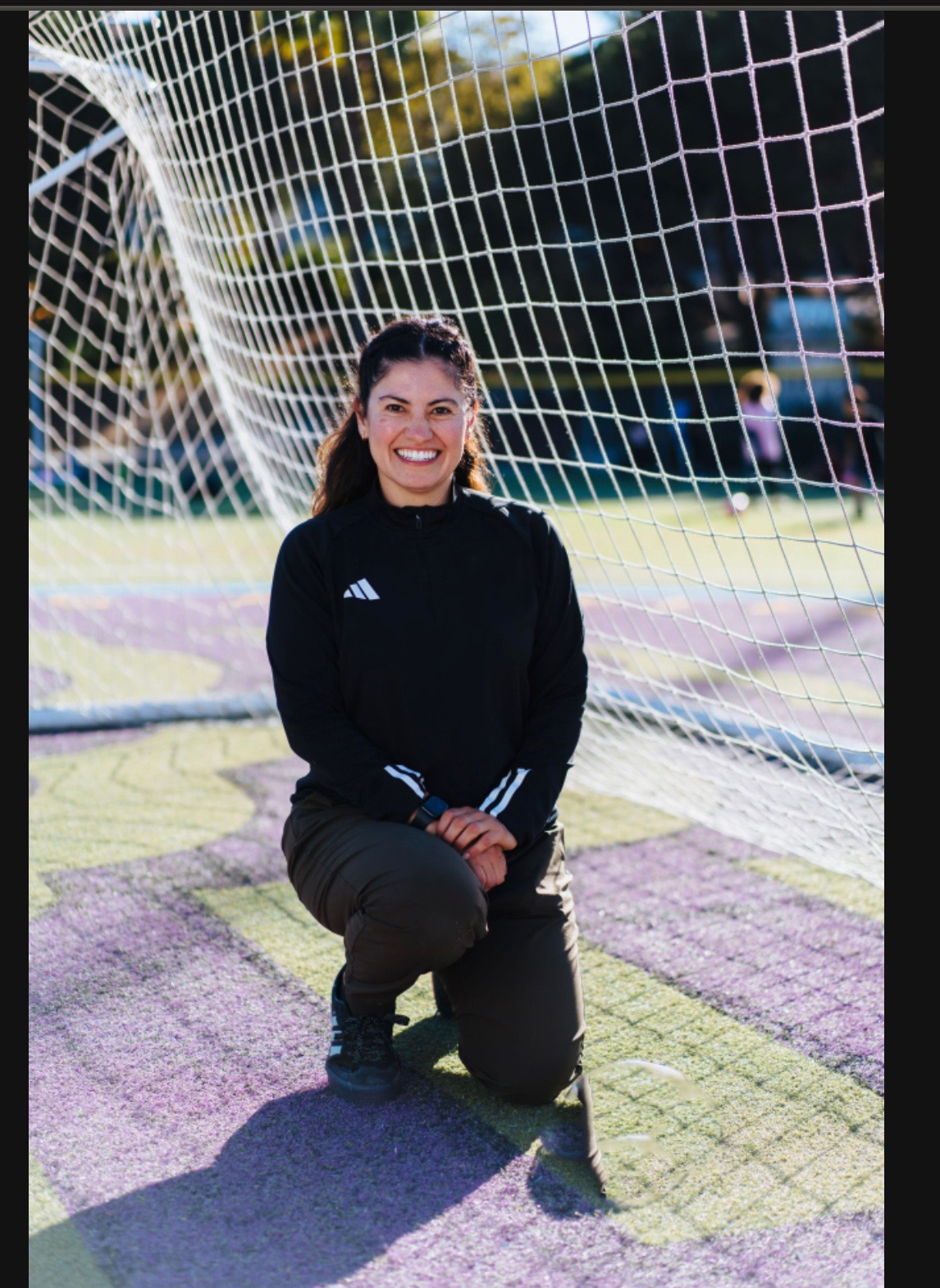 Claudia Orellana, Director of Coaching at Formula Soccer Center, on the training field.